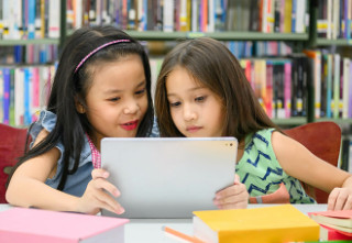 Children reading in library